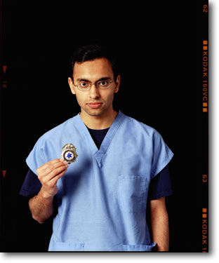 <em>Wasif is a practicing Muslim. He's worked as an EMT since high school. In the weeks after 9-11, he worked as an EMT and in the morgue.</em>
<br/><br/>
After 9-11, I would wear my EMT shirt so I wouldn't be harassed... I don't want to have to prove myself. Just because I'm Muslim doesn't mean I'm 'other'. We could talk about this a long time, how people focus on the enemy as a uniting point...
<br/><br/>
I had a goatee before 9-11, but I got rid of it a week later -- sort of less threatening... I thought I'd lay low I guess.
<br/><br/>
[Being Muslim] was something I had to deal with after 9-11. We're not a perfect country.
